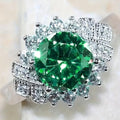 Emerald Grand Halo Statement Ring
