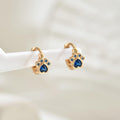 Sapphire Paw Huggie Earrings