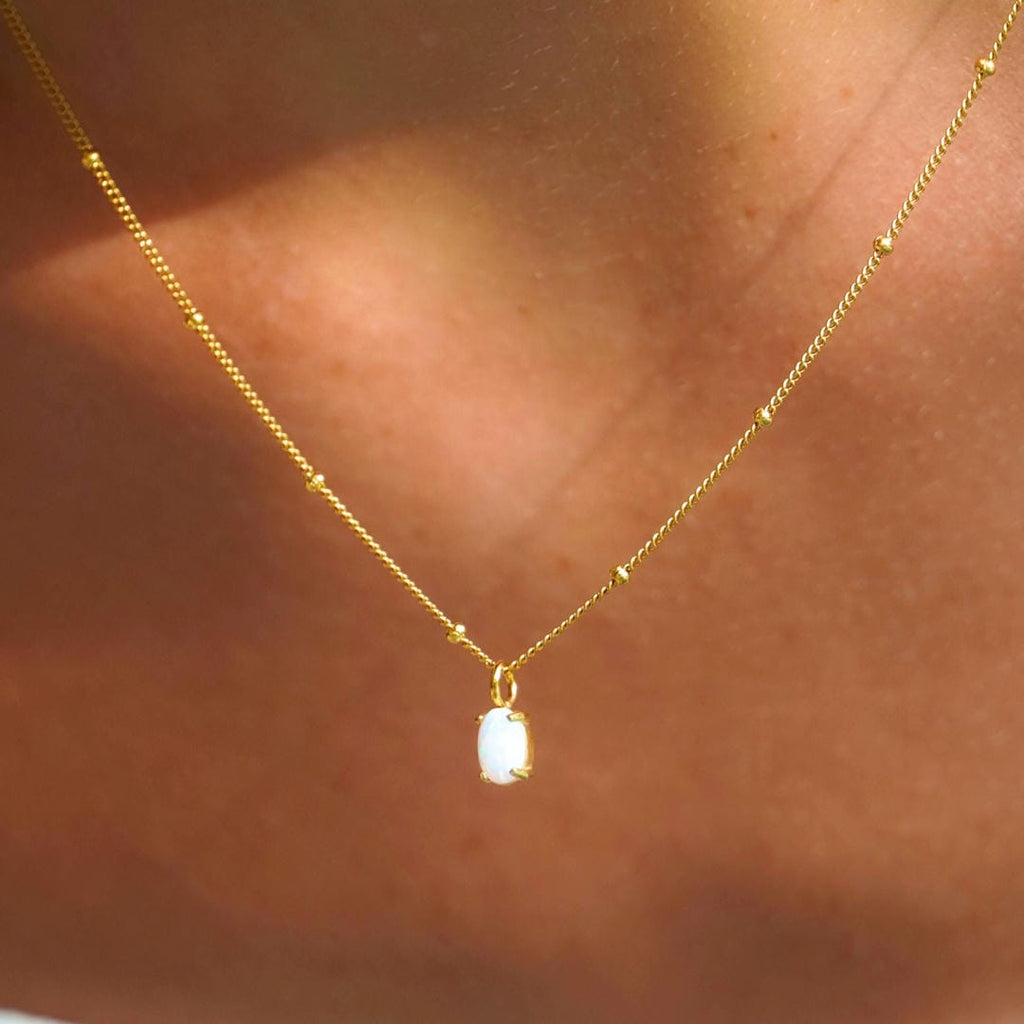 Gold Beaded Necklace with Opal Pendant