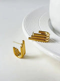 Lustrous Curved Ribbed Gold Earrings