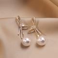 Pearl Earrings with Shiny Bow