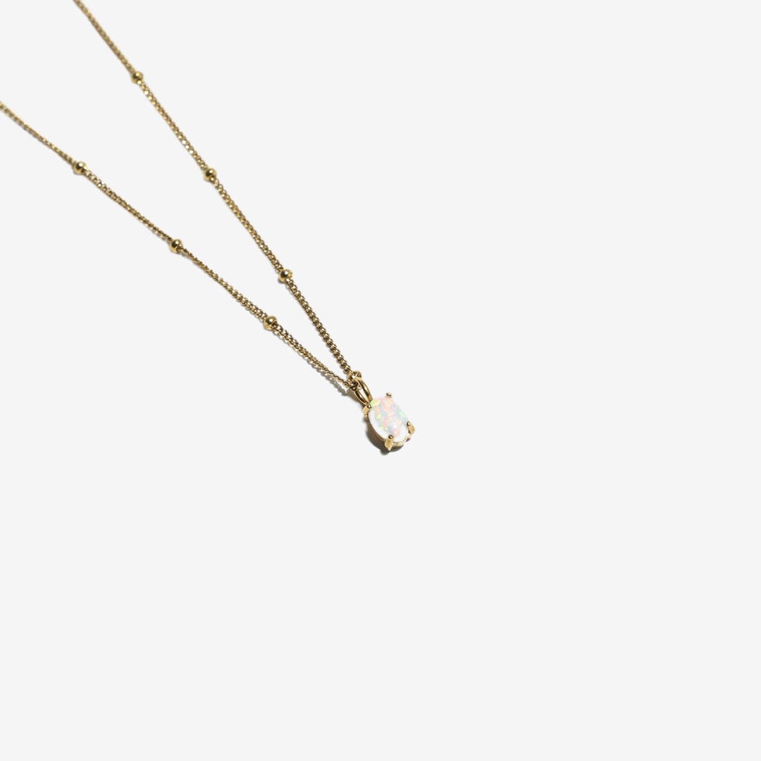 Gold Beaded Necklace with Opal Pendant
